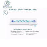 Blue and white braided cord with purple ends on clear acrylic training plate for surgical knot-tying trainer use